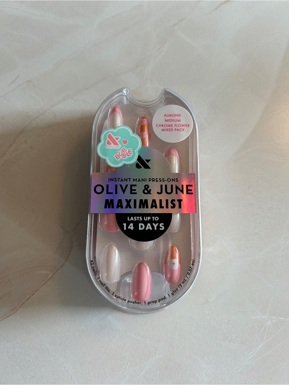 olive and june chrome flower medium almond press on nails